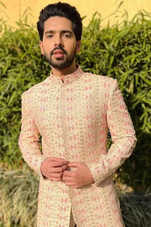BEIGE EMBELLISHED SHERWANI PAIRED WITH PINK PANTS